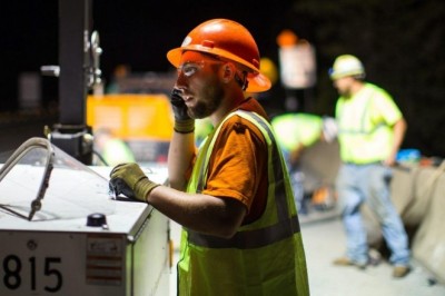 50,000 workers shifted to 2,000 new buildings to reduce overcrowding